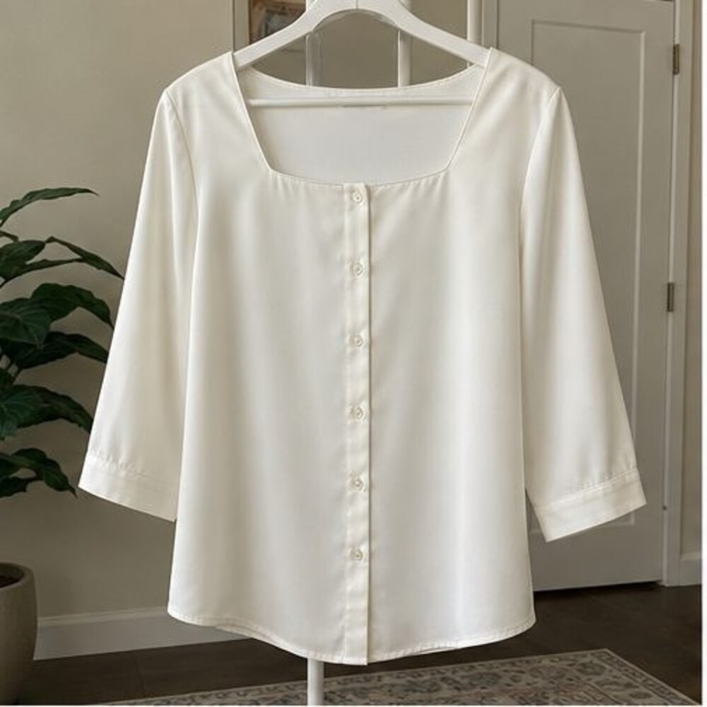 Ivory Peplum Top